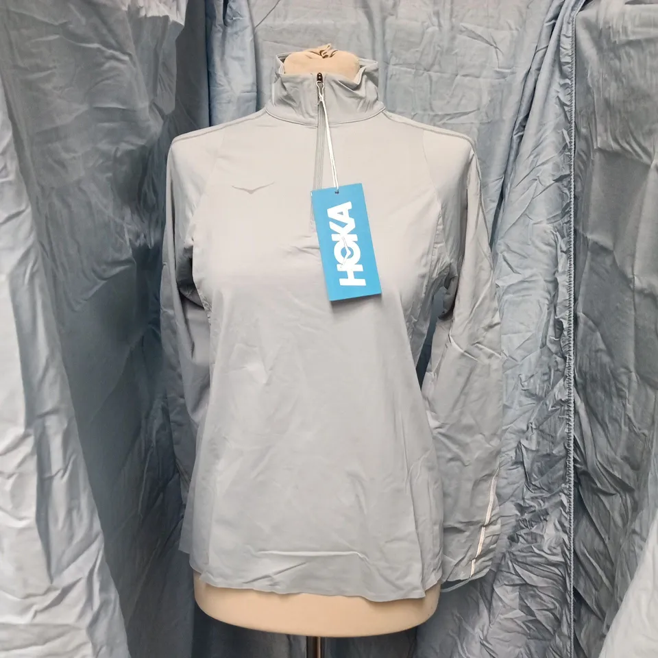 HOKA ONE ONE WOMEN'S GLIDETECH QUARTER ZIP TOP – UK SIZE S, LIGHT BLUE/GRAY
