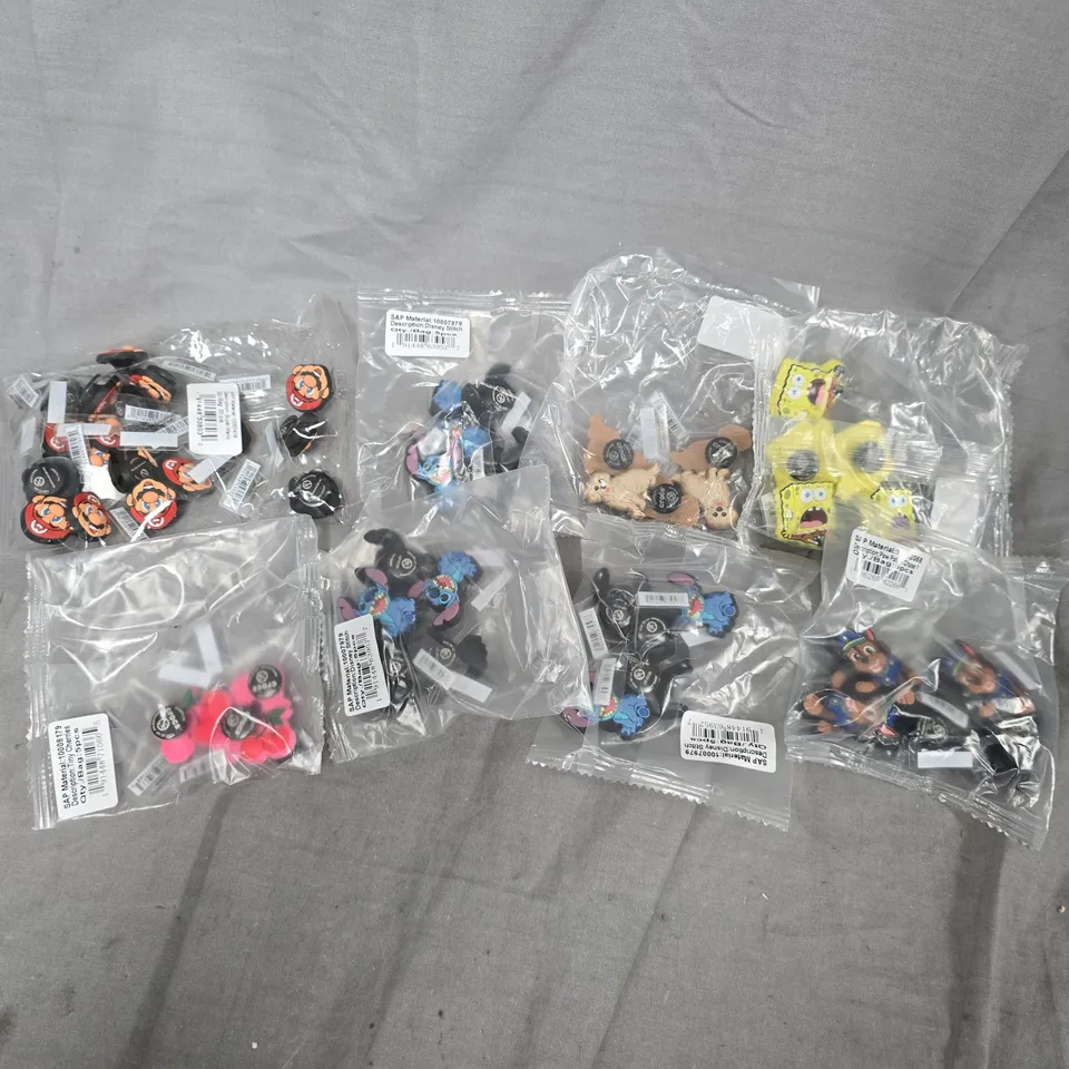 LARGE QUANTITY OF ASSORTED JIBBITZ CROC CHARMS TO INCLUDE PAW PATROL, SUPER MARIO, SPONGEBOB, ETC