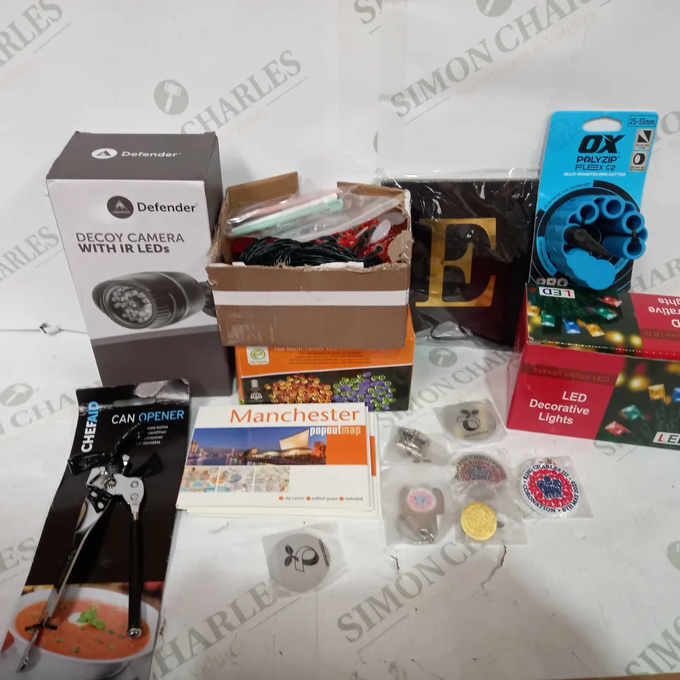 BOX TO CONTAIN APPROX 25 X ASSORTED HOUSEHOLD PRODUCTS, INCLUDES LED LIGHTS, DECOY CAMERA, CORONATION MEMORABILIA, CAN OPENER ETC