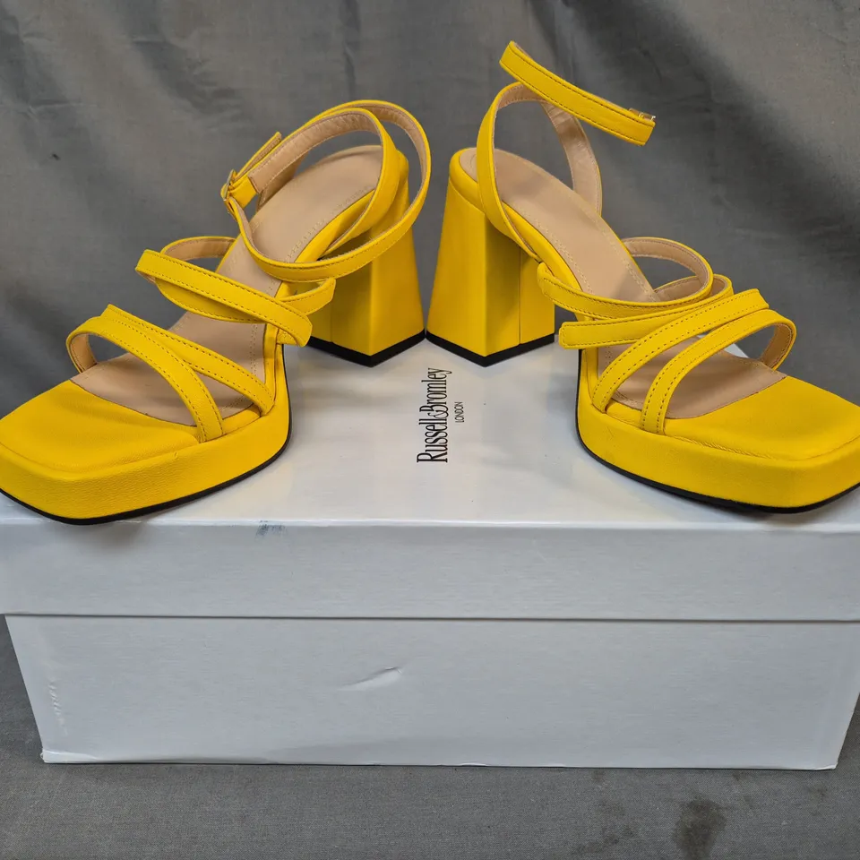 BOXED PAIR OF RUSSELL & BROMLEY OPEN TOE BLOCK HEEL STRAPPY SANDALS IN YELLOW EU SIZE 39.5