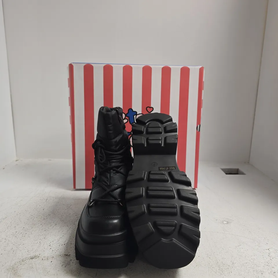 KOI BLACK PLATFORM WINTER BOOT WITH CHUNKY LUG SOLE – SIDE ZIP SIZE 4