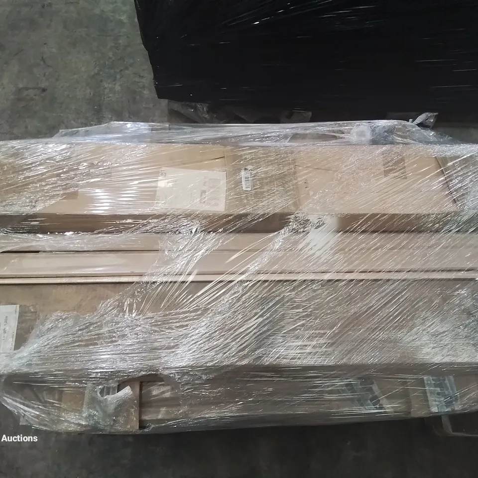 A PALLET OF SEVERAL DIFFERENT STAIR NOSES IN A VARIETY OF COLOURS AND SIZES