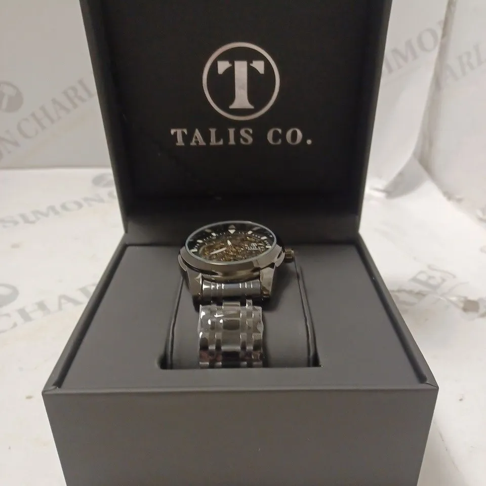 MEN’S TALIS CO 7820 AUTOMATIC WATCH – BLACK SKELETON DIAL AND CASE – STAINLESS STEEL STRAP – GLASS BACKCASE