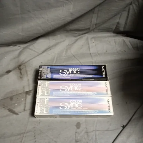 BOX OF APPROXIMATELY 60 MATRIX HAIR CARE PRODUCTS INCLUDING COLOR SYNC MEDIUM BLONDE VIOLET ASH/BRUNETTE NEUTRAL/BRUNETTE MOCHA/BRUNETTE ASH/CLEAR