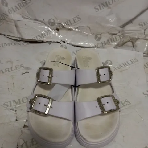 PAIR OF RIEKER DOUBLE STRAP SANDALS IN WHITE SIZE 5