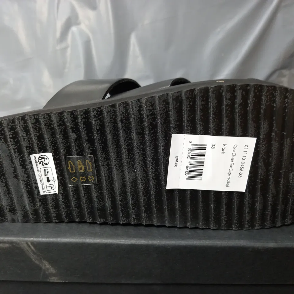 BOXED PAIR OF HUSH CORA CLOSED TOE CAGE FOOTBED SHOES IN BLACK - SIZE 38 
