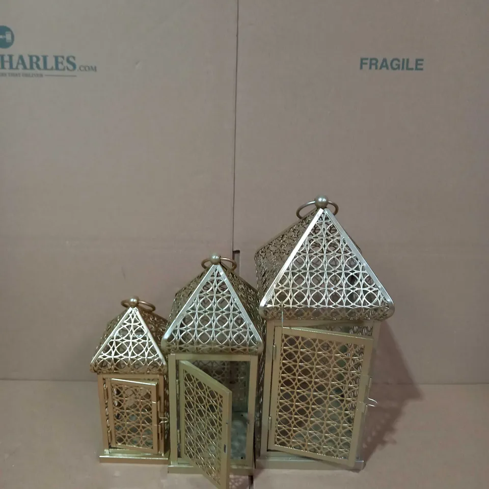ALISON CORK SET OF INDOOR/ OUTDOOR FRETWORK METAL LANTERNS GOLD