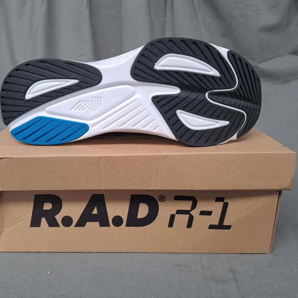 BOXED PAIR OF R.A.D R-1 TRAINERS IN WHITE/METALLIC SILVER UK SIZE 9