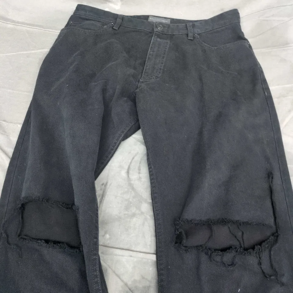 BALENCIAGA UNISEX DISTRESSED DENIM JEANS – BLACK WITH KNEE RIPS - SIZE UNSPECIFIED 