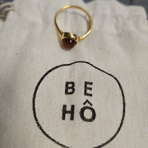 BE HO GOLD-TONE RING WITH RED CABOCHON STONE