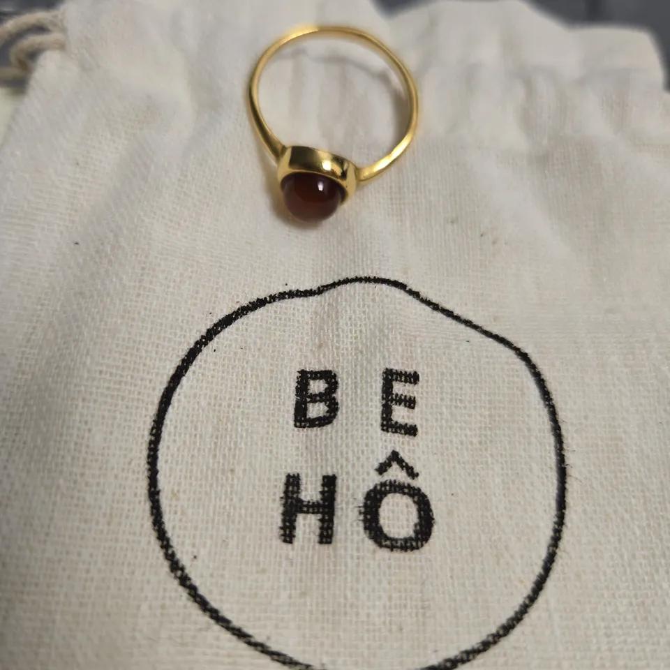 BE HO GOLD-TONE RING WITH RED CABOCHON STONE