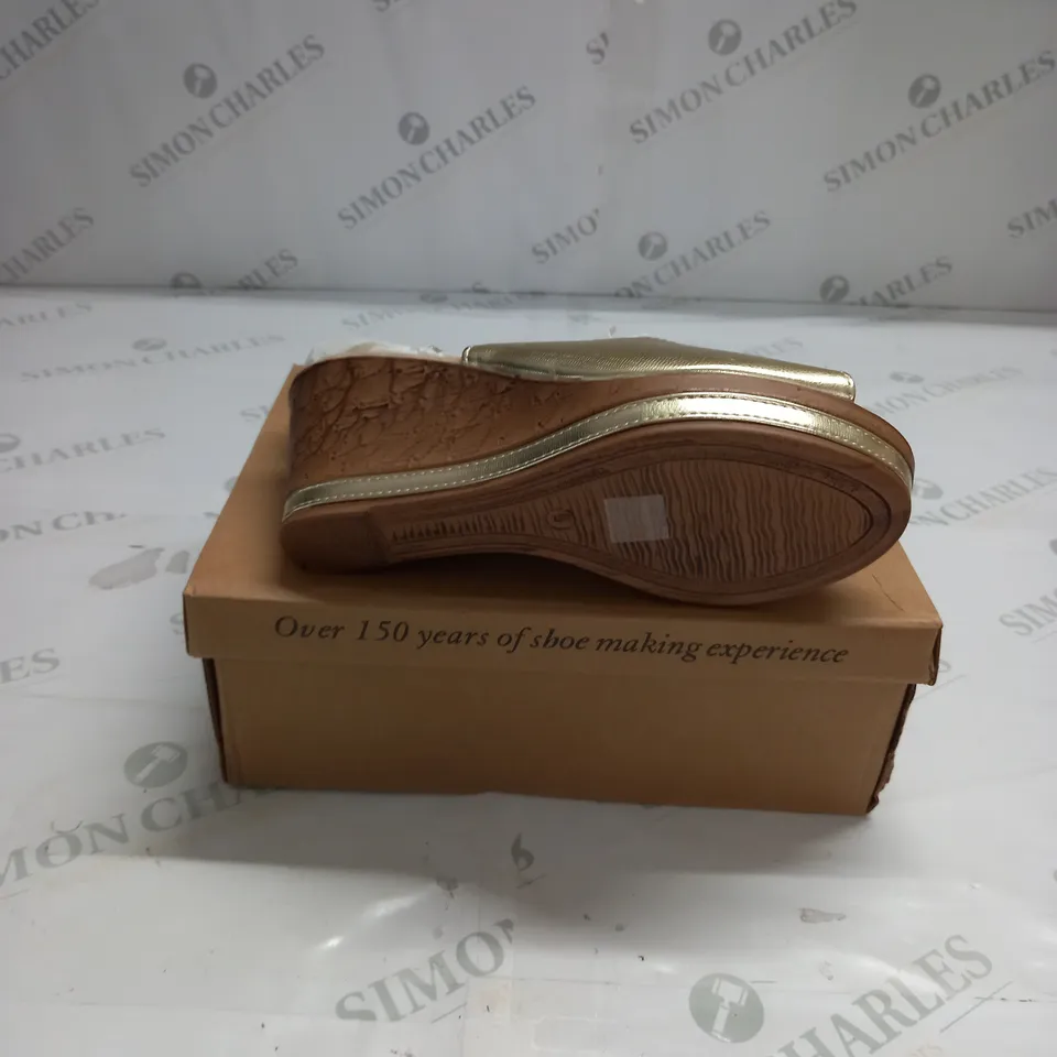 BOXED PAIR OF CUSHION WALK GOLD WEDGE HEEL SHOES IN GOLD - SIZE 5