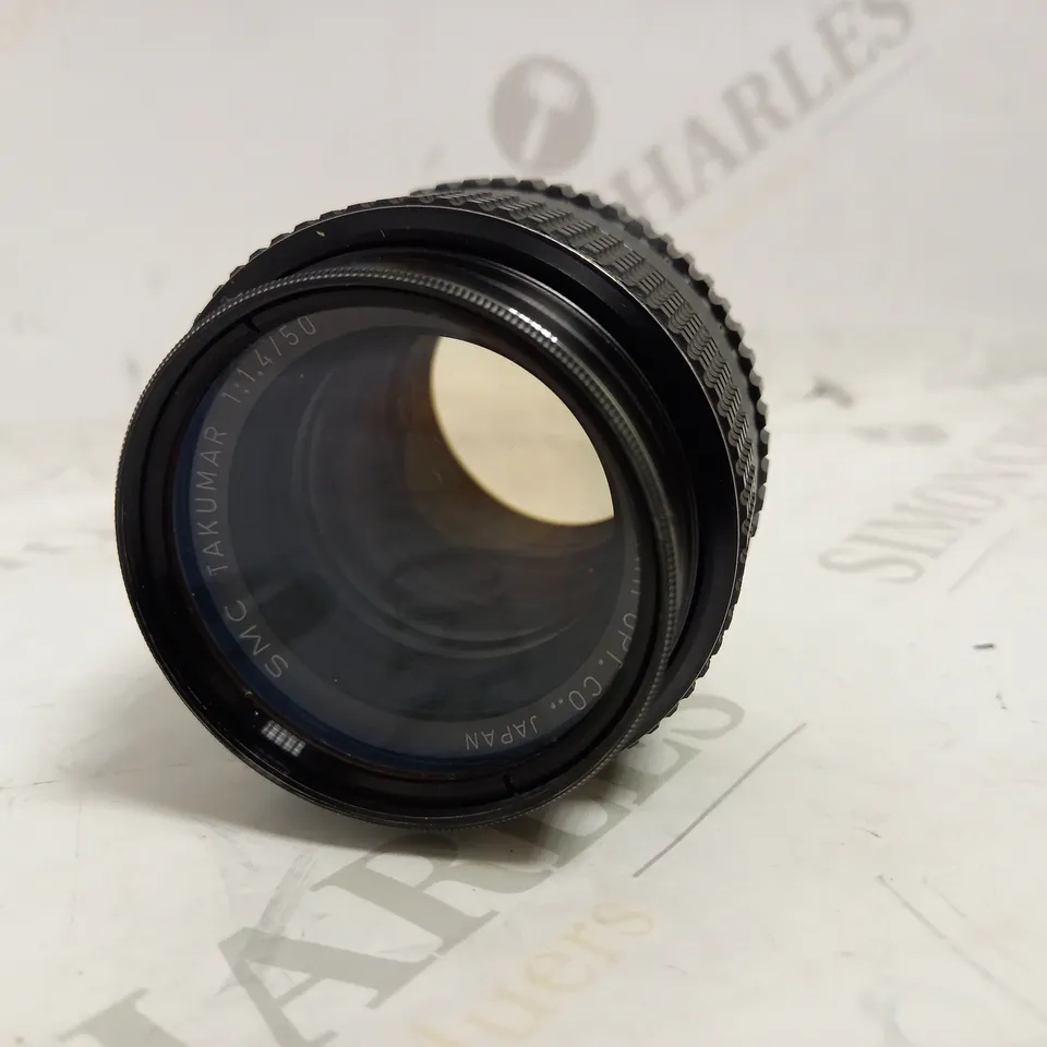 ASAHI PENTAX SMC TAKUMAR 1:1.4/50 AROMA 49MM SKYLIGHT IA