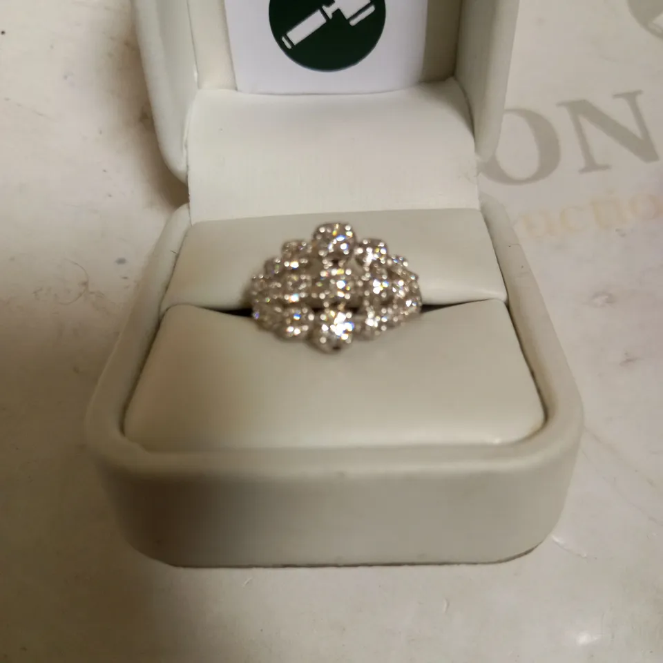 18CT WHITE GOLD THREE ROW GRADUATED RING SET WITH DIAMONDS WEIGHING +1.41CT