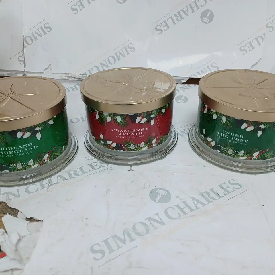 THREE CHRISTMAS THEMED CANDLES
