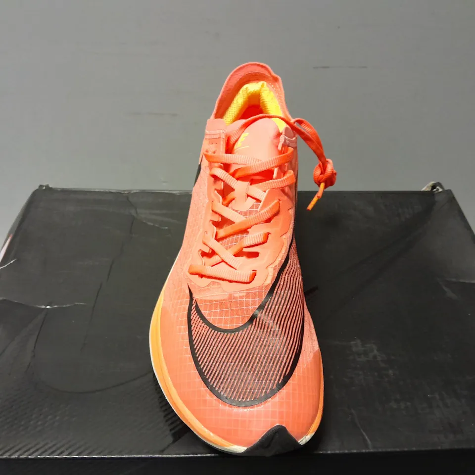 BOXED PAIR OF NIKE WOMENS ZOOMX VAPORFLY NEXT% TRAINERS IN ORANGE/WHITE - UK 5.5