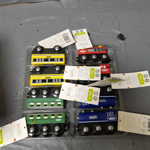 APPROXIMATELY 16 WOODEN MINI TRAINS - ASSORTED COLOURS
