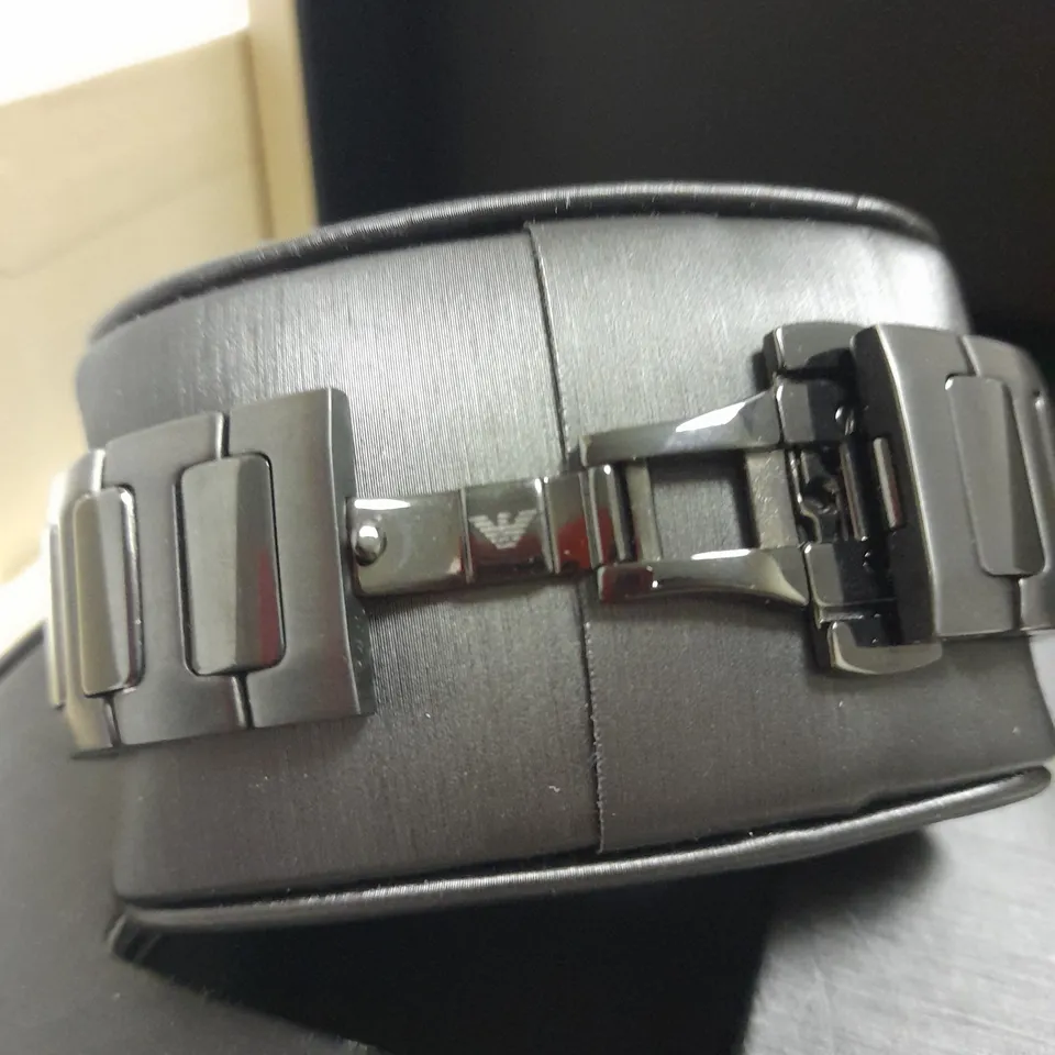 EMPORIO ARMANI SWISS AUTOMATIC BLACK STAINLESS STEEL WATCH WITH LINK FASTENING DETAIL