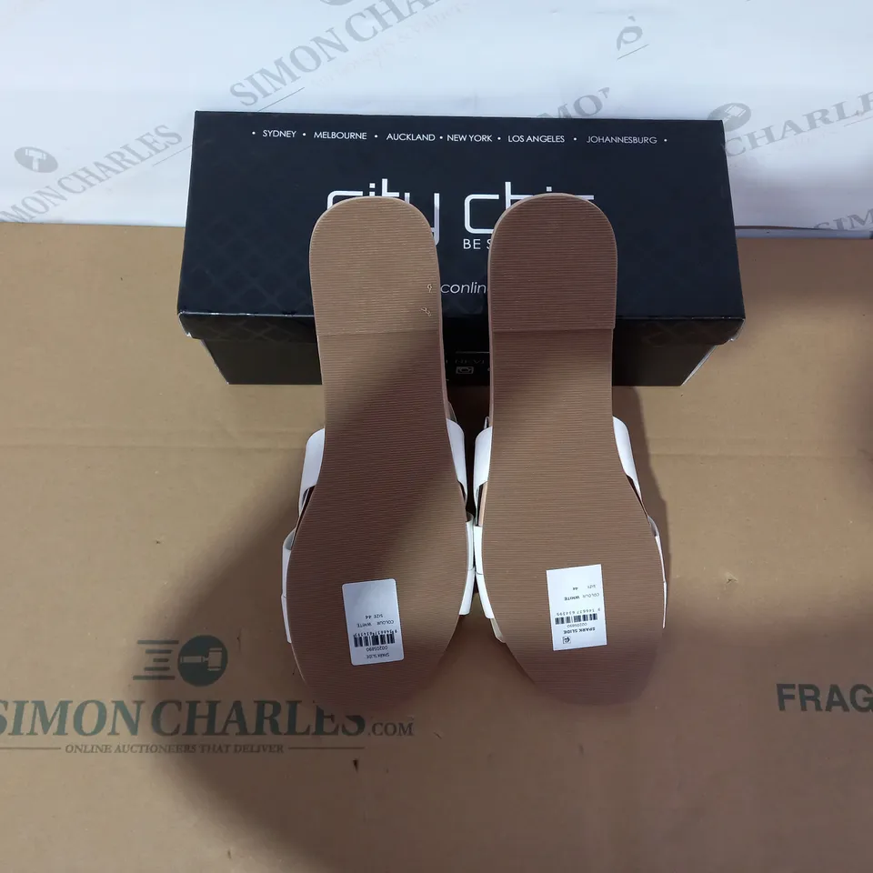 BOXED PAIR OF CITY CHIC WHITE SLIDERS SIZE 44