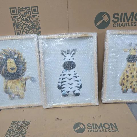 3X ANIMAL FRAMED PHOTOS TO INCLUDE: LION, ZEBRA AND GIRAFFE