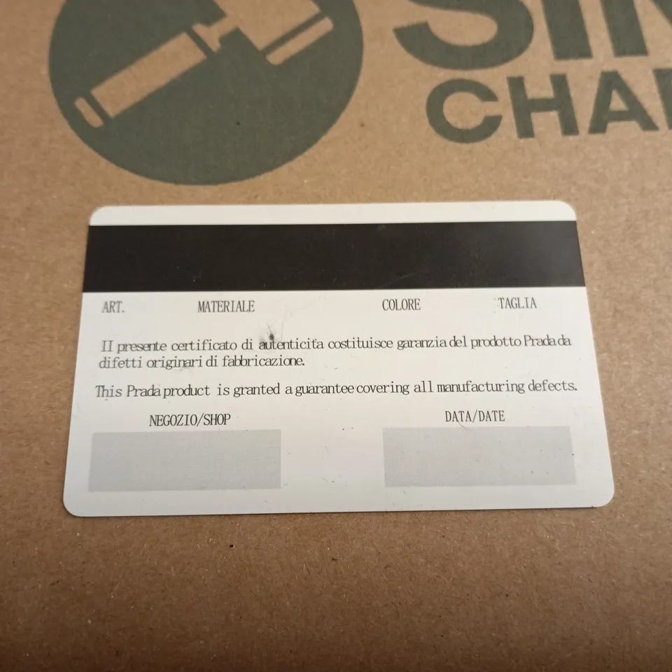 BOXED PAIR OF PRADA SUNGLASSES