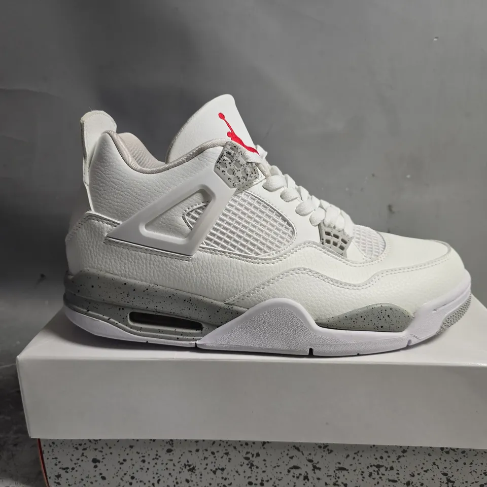 BOXED PAIR OF NIKE JORDAN RETRO 4 TRAINERS IN WHITE - UK 10