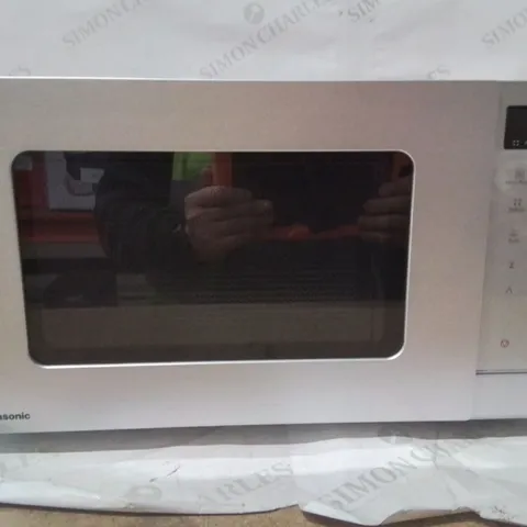 BOXED PANASONIC MICROWAVE OVEN SILVER 