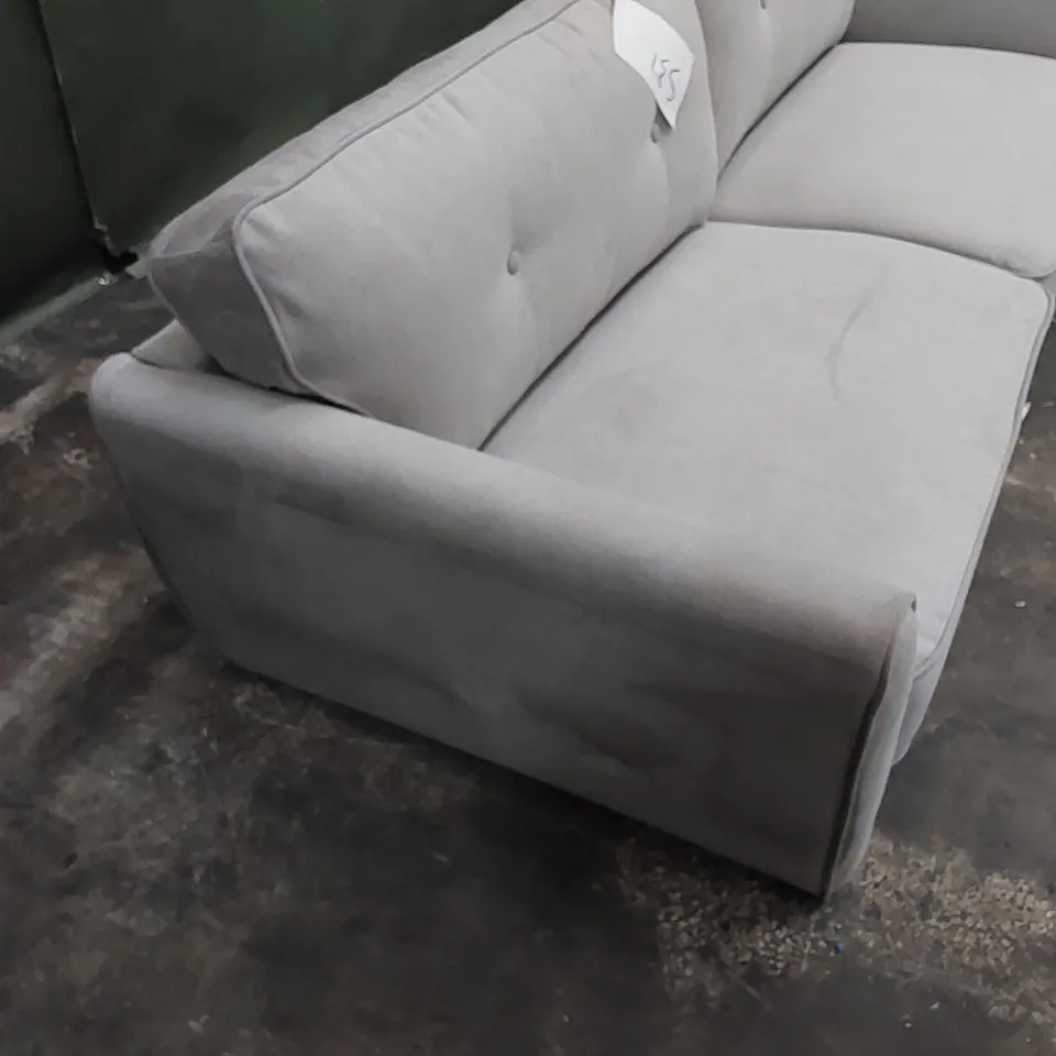 DESIGNER LARGE SOFA UPHOLSTERED IN FABRIC 