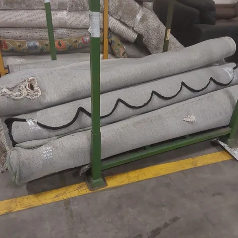 STILLAGE CONTAINING 6x DAMAGED DESIGNER RUGS