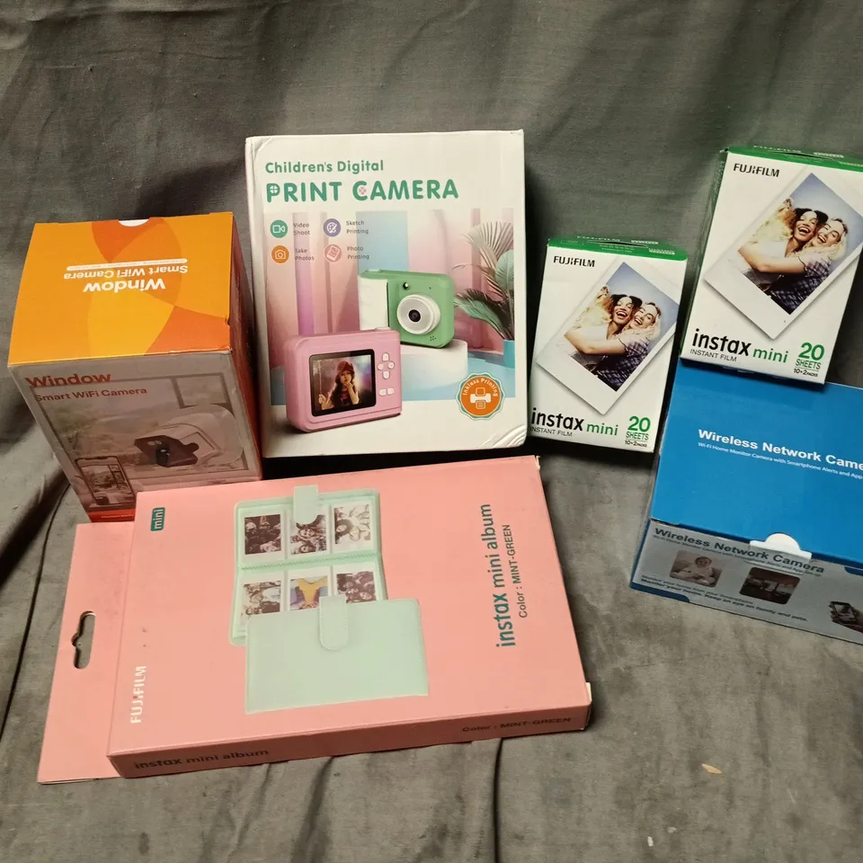 APPROXIMATELY 12 ASSORTED PHOTOGRAPHY ITEMS TO INCLUDE DIGITAL PRINT CAMERA, FUJIFILM INSTAX MINI ALBUM, FUJIFILM INSTANT FILM, ETC