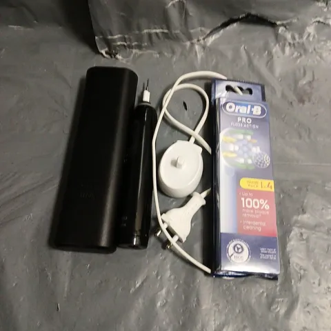 ORAL B ELECTRIC TOOTHBRUSH IN BLACK WITH CASE, CHARGER AND BRUSH HEADS