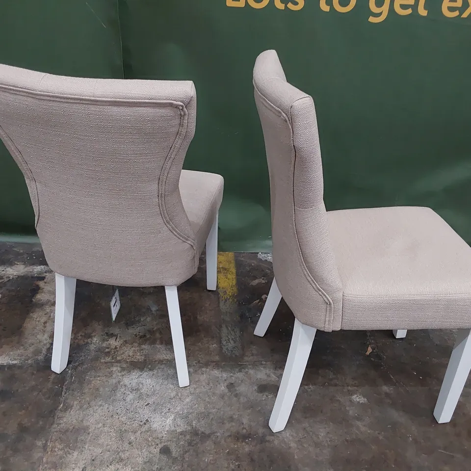 PAIR UPHOLSTERED BUTTONED BACK DINING CHAIRS NATURAL FABRIC ON WHITE PAINTED LEGS 
