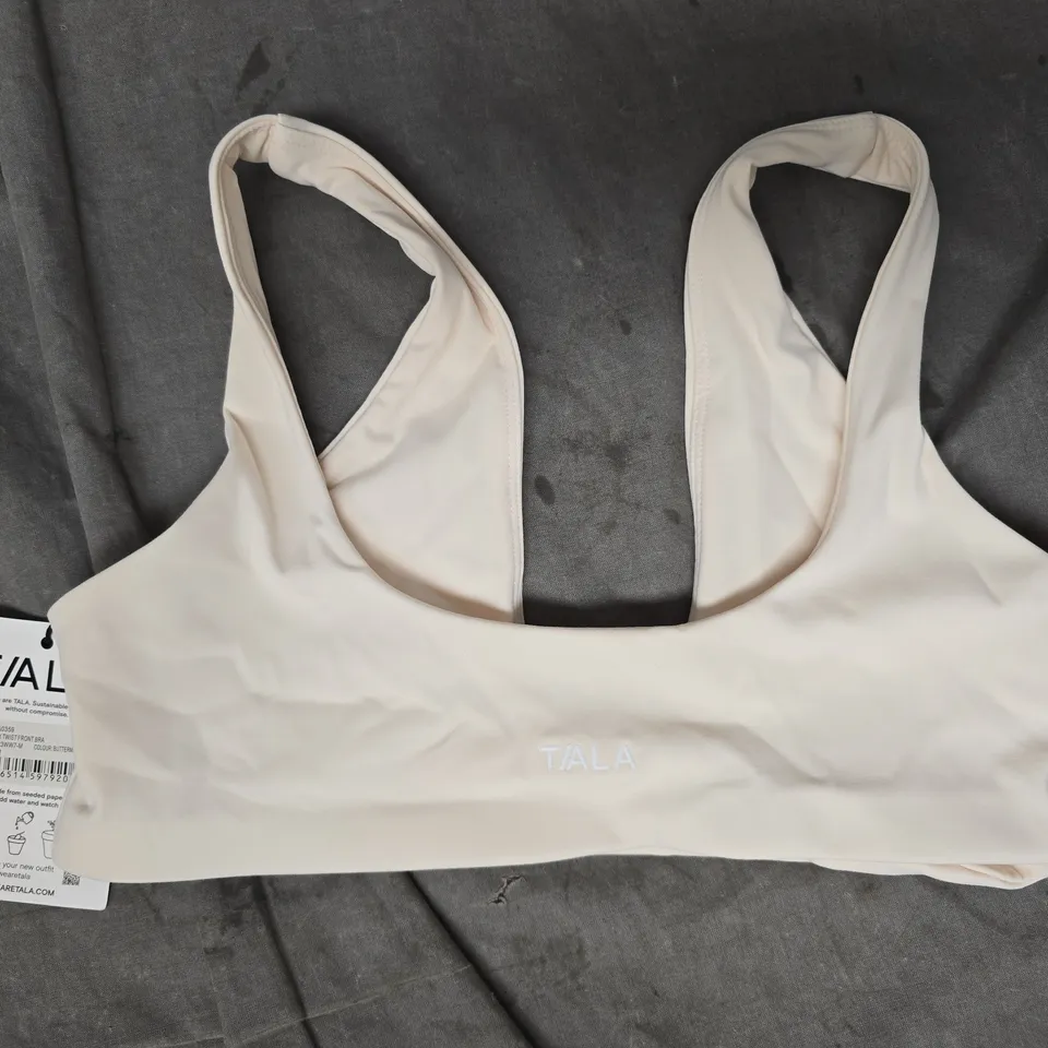 T/ALA DAYFLEX TWIST FRONT BRA IN BUTTERMILK SIZE MEDIUM