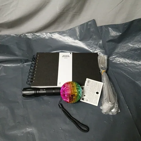 APPROXIMATELY 20 ASSORTED HOUSEHOLD ITEMS TO INCLUDE SKETCHBOOK, CUTLERY, TORCH, DISCO BALL HANGING DECORATION ETC