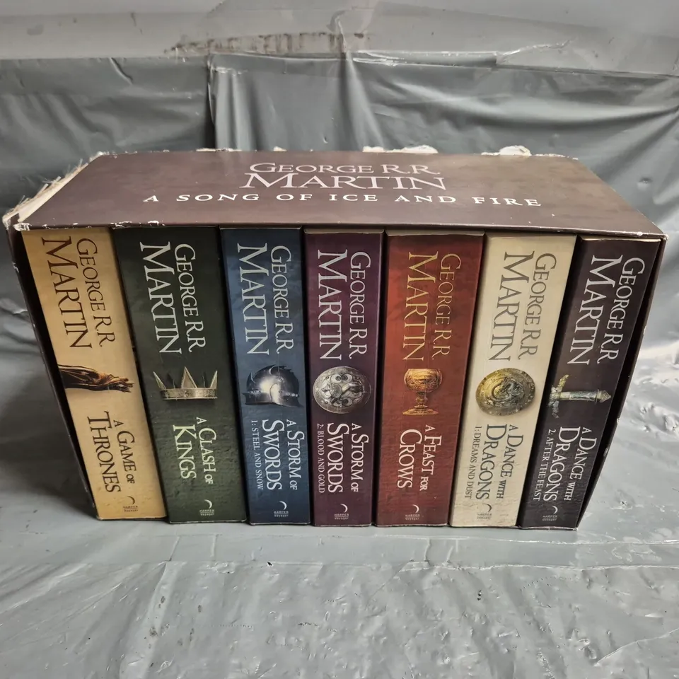 A GAME OF THRONES: THE STORY CONTINUES (7 BOOKS) BY GEORGE R.R. MARTIN