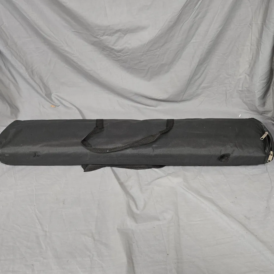 RETRACTABLE VINYL SIGN READING "RIDGE PHARMA" IN METAL CASE WITH LEGS. IN BLACK CARRY CASE