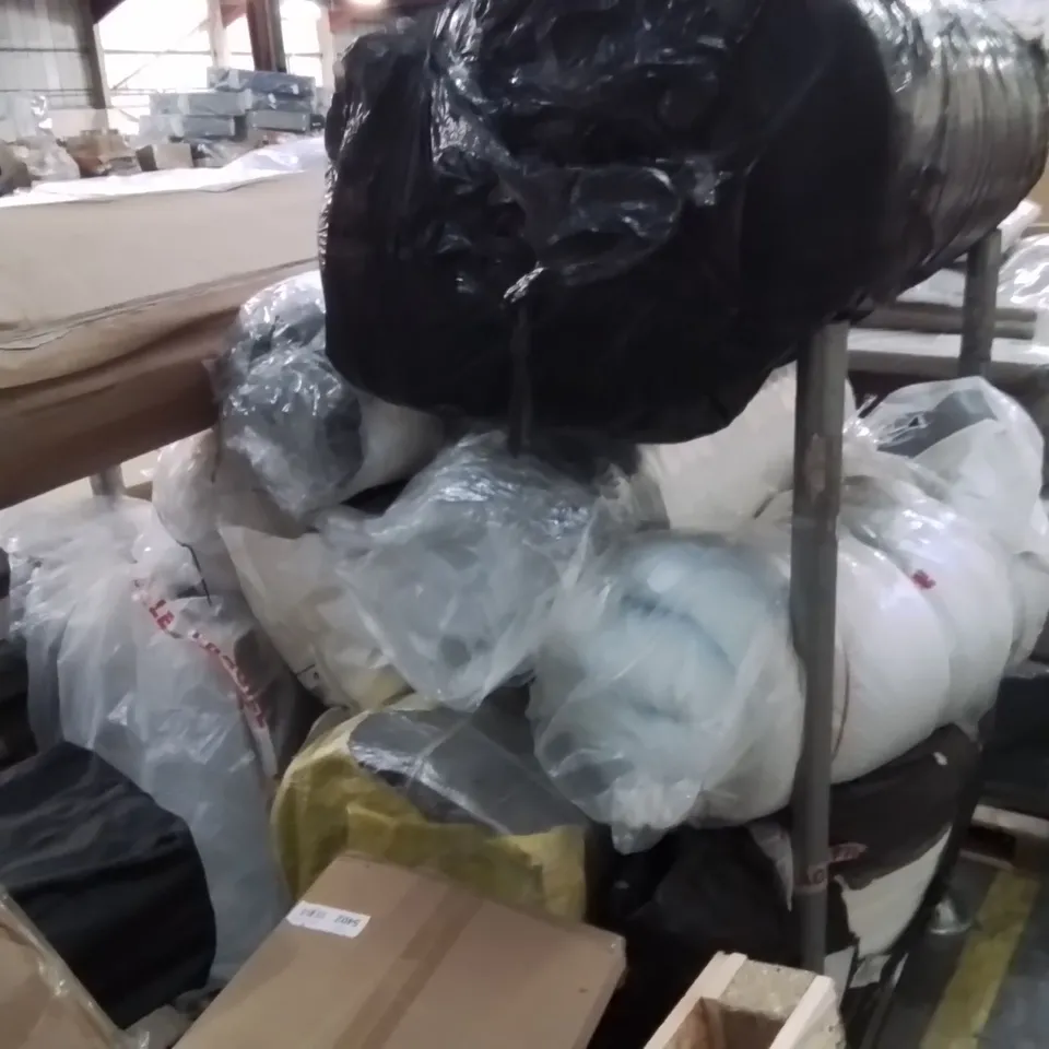 CAGE CONTAINING LARGE QUANTITY OF ROLLED MATTRESSES 