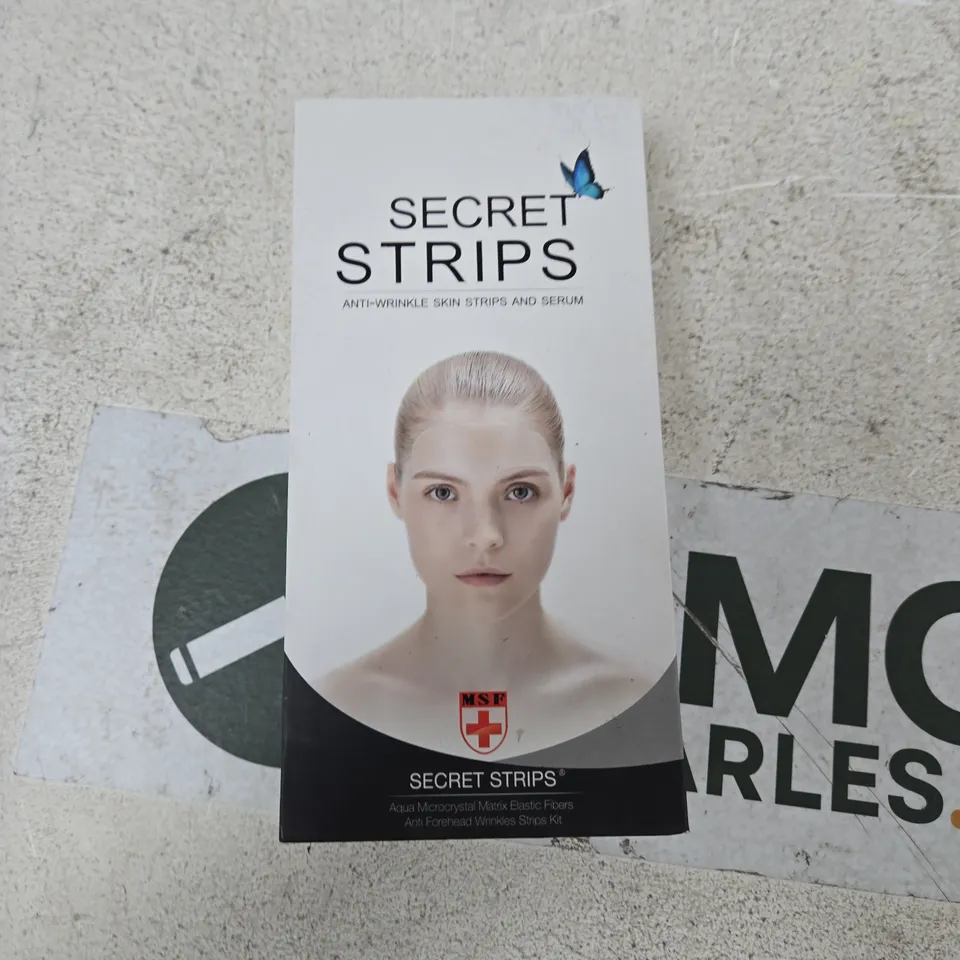 BOX OF APPROXIMATELY 20 ASSORTED ITEMS TO INCLUDE: SECRET STRIPS (ANTI WRINKLE)
