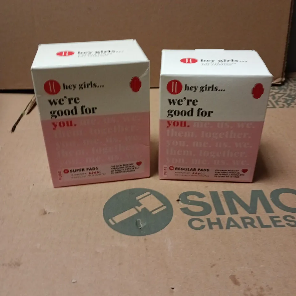BOX OF APPROXIMATELY 18 PACKS OF HEY GIRLS SANITARY TOWELS REGULAR AND SUPER