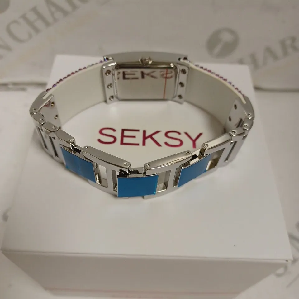 BOXED SEKSY BY SEKONDA LADIES STONE SET WATCH WITH STAINLESS STEEL BACK - JAPAN MOVEMENT. 