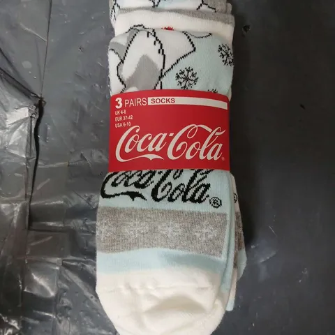 APPROXIMATELY 220 PAIRS OF COCA COLA POLAR BEAR SOCKS (4-8) - COLLECTION ONLY