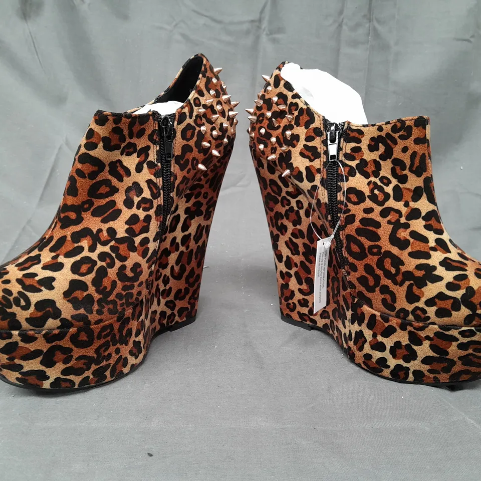 BOX OF APPROXIMATELY 10 BOXED PAIRS OF CASANDRA PLATFORM WEDGES IN LEOPARD PRINT - VARIOUS SIZES