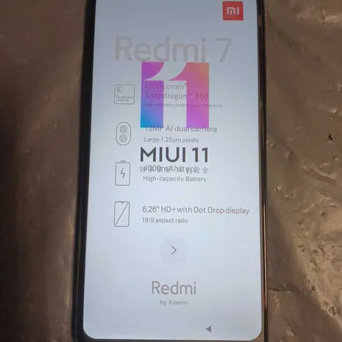 BOXED REDMI 7 4+64GB PHONE IN BLACK