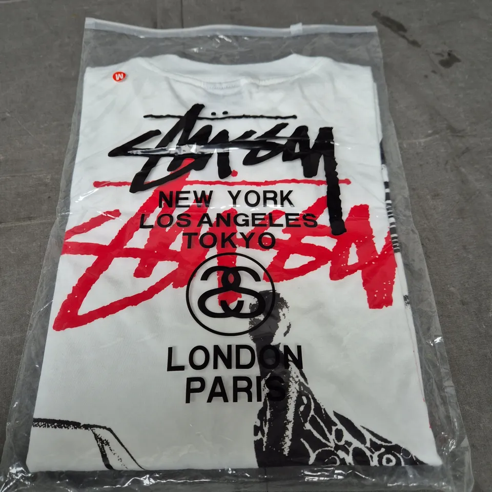 STÜSSY GRAPHIC T‑SHIRT – WHITE WITH NYC/LONDON PARIS MOTIF SIZE M 