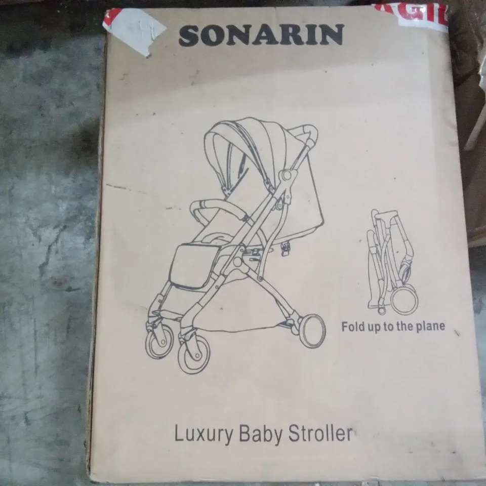 PALLET OF ASSORTED ITEMS INCLUDING SONATINA LUXURY BABY STROLLER, GAMING RACING WHEEL, PADDLES AND GEAR STICK, VINYL PLAYERS