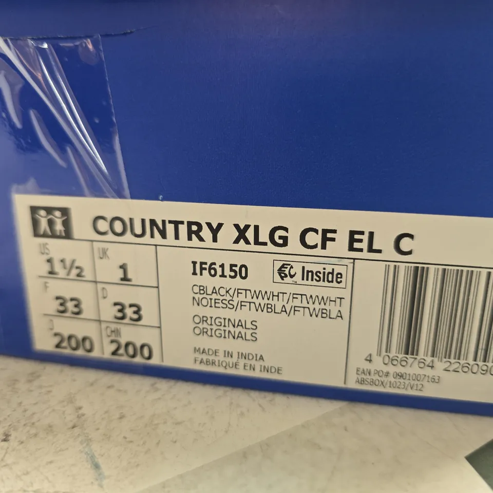 BOXED PAIR OF KIDS ADIDAS COUNTRY XLG CF EL C TRAINERS – BLACK/WHITE, UK 11