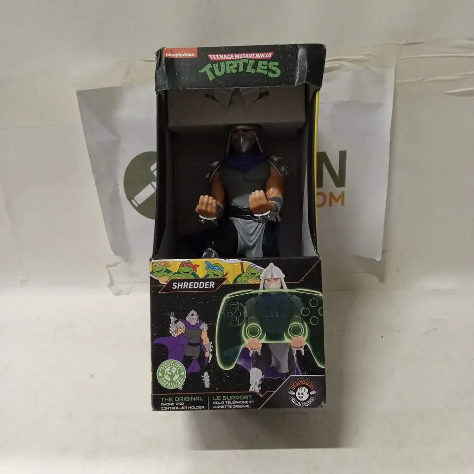 TMNT SHREDDER PHONE AND CONTROLLER HOLDER – BOXED (NINJA TURTLES)