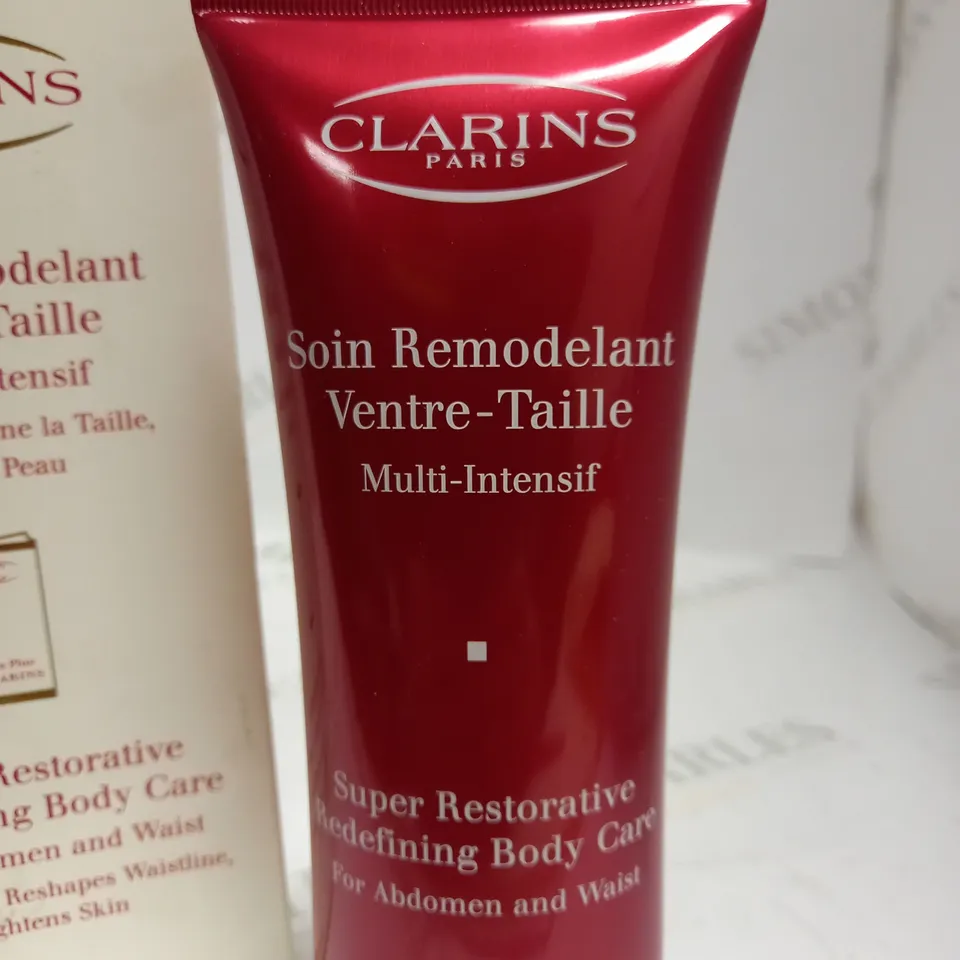 CLARINS SUPER RESTORATIVE REDEFINING BODY CARE
