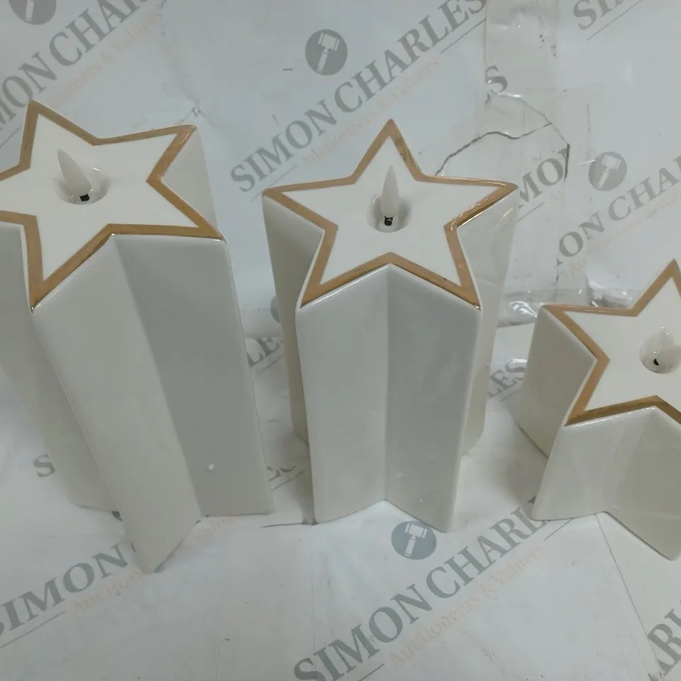 BOXED HOME REFLECTIONS SET OF 3 PRE-LIT WHITE STAR CANDLES