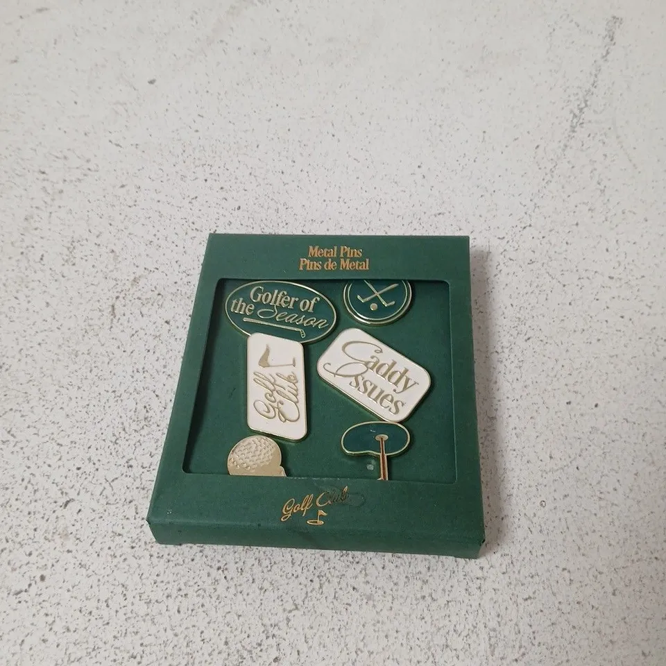 APPROXIMATELY 20 ASSORTED HOUSEHOLD ITEMS INCLUDING METAL GOLF PINS , AAA BATTERIES AND MONKEY GRIP CREAM 